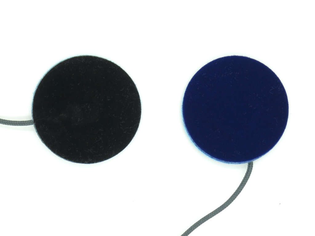 Cozyphones speaker inserts: The black side faces the fleece.